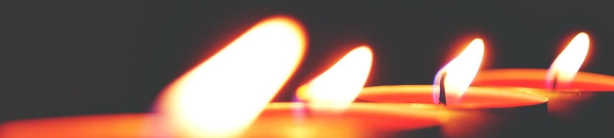 Row of lit tealight candles: Business Insider on Dua, the AI doula in Soula