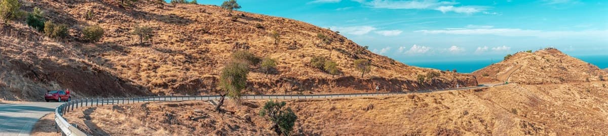 Cyprus hillside road above the sea: EU-Startups 2023 Cyprus list with Soula