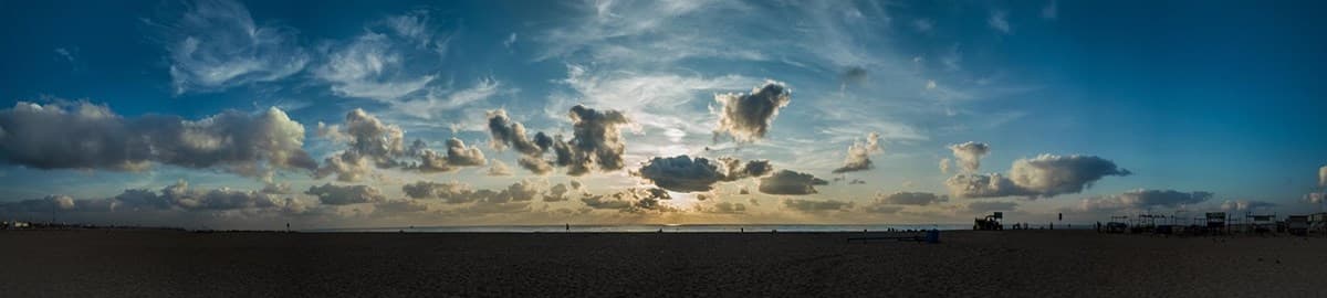 Beach at dusk under a cloudy sky: Soula wins first place at ReflectX 2023